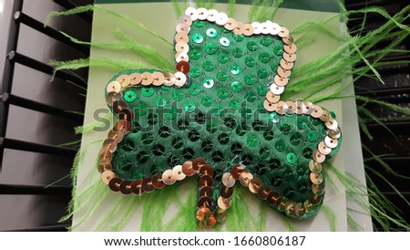 Green and gold sequined shamrock