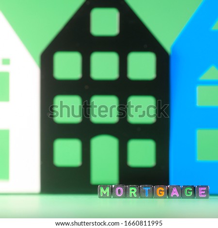 image of houses from the designer and the inscription mortgage from cubes
