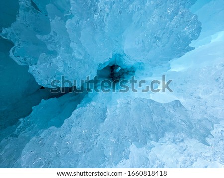 This picture shoot in the Ice cave by slide under the frozen snow, It have just a small space to move in but not too hard to get in there. Thank you nature for this shot :)