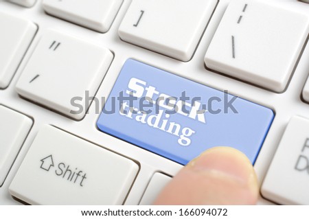 Pressing stock trading key on keyboard