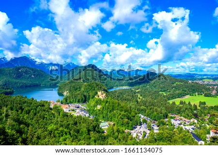 Alpsee and Schwansee at neuschwanstein and hohenschwangau castle - lake near Fuessen in beautiful mountain scenery of Allgaeu, Bavaria, Germany Royalty-Free Stock Photo #1661134075