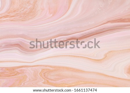 Fluid art texture. Backdrop with abstract iridescent paint effect. Liquid acrylic artwork with artistic mixed paints. Can be used for baner or wallpaper. Beige, brown and white overflowing colors