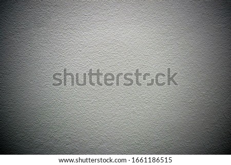 texture of concrete wall painted in gray-pink color