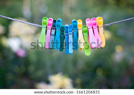 Rope with colorful clothes pegs