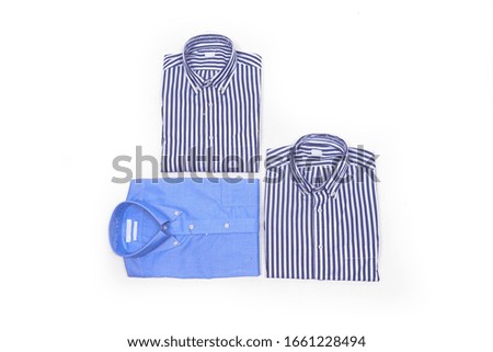 Top view ,Classic men's folded blue and striped shirt
