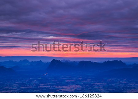 Beautiful winter sunrise in mountains and first light morning sunrise in nature