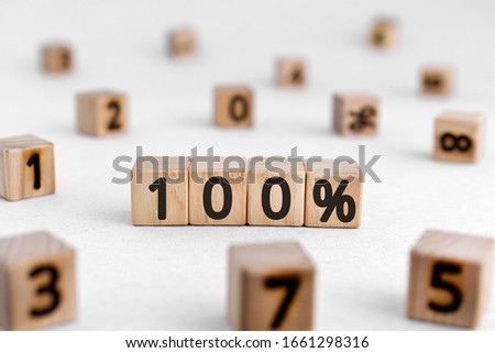 100% - from wooden blocks with digits, white background random numbers around