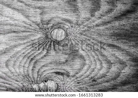 Dark gray wood texture with abstract pattern, background