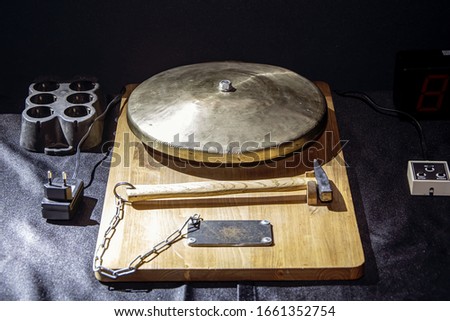 Boxing Gong made of brass on a stand with a hammer, accessories for the ring.