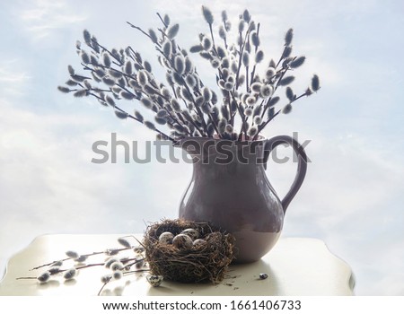 Spring's still life with bouquet of willow branches