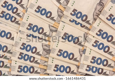 pile of 500 banknotes ukrainian money as financial background. UAH. Money and save concept