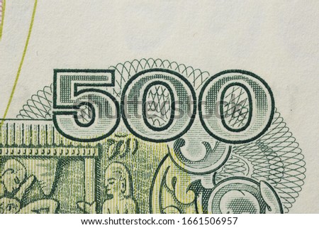 Vintage currency (paper money) detail. Bright design element of money bill. Paper texture.
