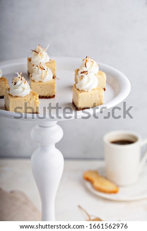 Bite sized dessert, coconut cream pie cut on a cake stand Royalty-Free Stock Photo #1661562976