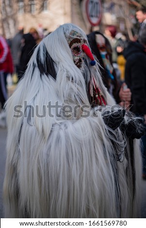 Mummers perform rituals to scare evil spirits people with the masks are called Kuker or kukeri in Kalugerovo village, Bulgaria