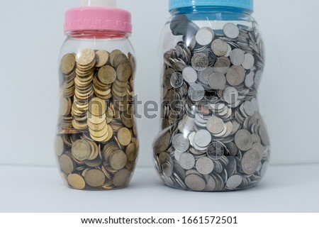 Malaysian coins (syiling) in ringgit malaysia in box isolated white background,financial concept.