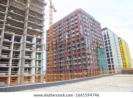 Construction, building, apartment building and office center. 