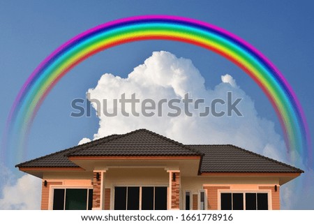 The tile roofs with beautiful rainbow in the sky are perfect for use in backgrounds and designs.