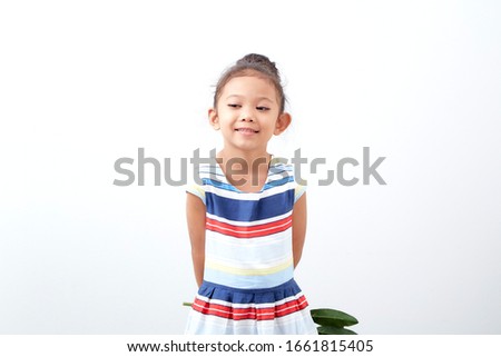 Portrait Happy funny asian cute child girl easter day hand holding  bouquet purple tulip on white background . Happy easter