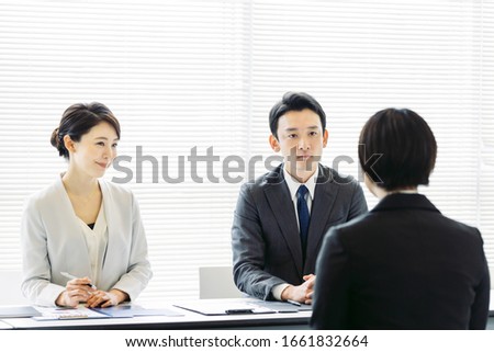 Job interview concept. Group of businessperson in the office. Royalty-Free Stock Photo #1661832664