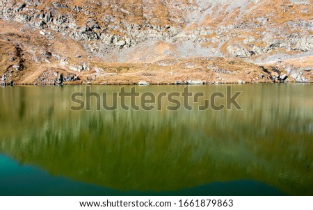 Mountain nature landscape , glacial lake in valley, Fagaras Mountain, Romania