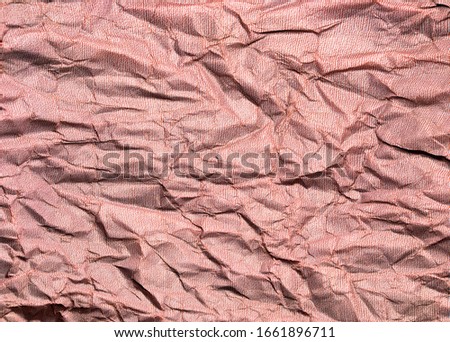 Beautiful pattern of red crumpled paper texture background. 