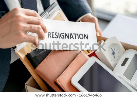 Stressful businessman quit a job with resignation letter.