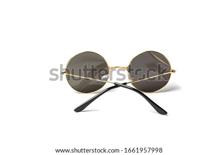 Round glasses with blue glasses on a white background