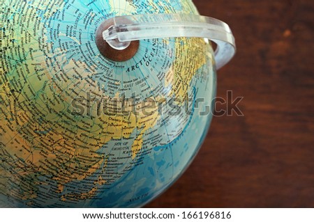 Part of a globe with map of North Asia and Arctic