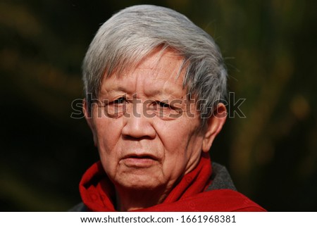 The old man looking at the camera Royalty-Free Stock Photo #1661968381