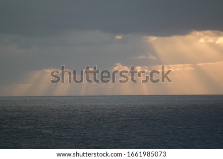 Pastel tone sky and the soft sun light to the sea