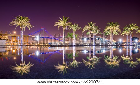 Vincent Thomas Bridge and Palm Tree reflections in San Pedro, Los Angeles, California.