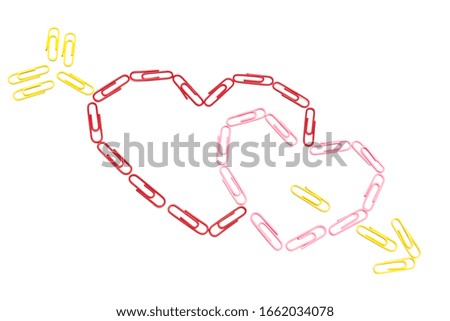 Paper clips hearts on the isolated background