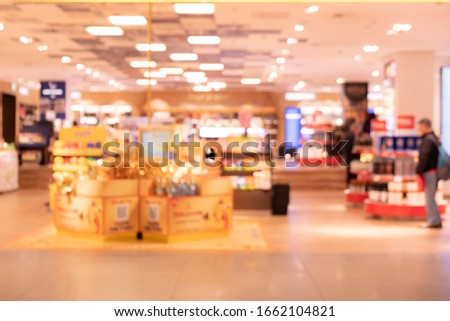 Background of duty free shop in airport out of focus