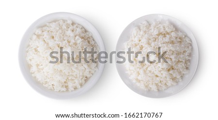 cooked rice in white plate on white background. top view Royalty-Free Stock Photo #1662170767