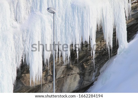 Massive ice column looks like a frozen waterfall