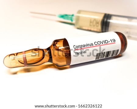 New Vaccine for Coronavirus COVID 19. Concept Medical container with Corona Virus Vaccines. Korona Vaccination Medical Syringe needle Outbreak. Usa, China, Italy Royalty-Free Stock Photo #1662326122