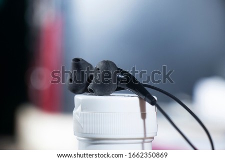 Black headphones blur background stock photo