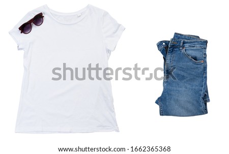 A white blank t-shirt and denim you can put photos or something on the front of it an image isolated on white