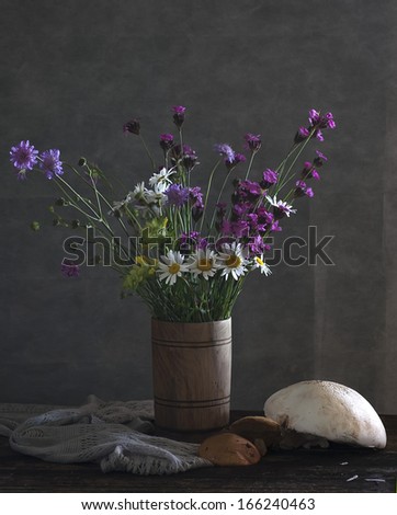 Still life with daisies and wild flowers