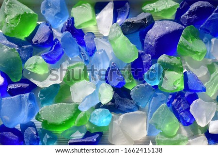 Vibrant blue, green, aqua, aquamarine and turquoise sea glass Royalty-Free Stock Photo #1662415138
