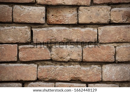 Surface of old red brick wall