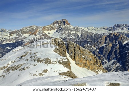 Dolomite mountains in the winter, view from Mount Tofana towards Hohe Gaisl-Croda Rossa. Ski Area Tofana, Cortina d'Ampezzo, Dolomites, North Italy. The Dolomites are a UNESCO World Heritage Site Royalty-Free Stock Photo #1662473437