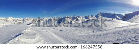 beautiful snowy mountain landscape in winter under blue sky