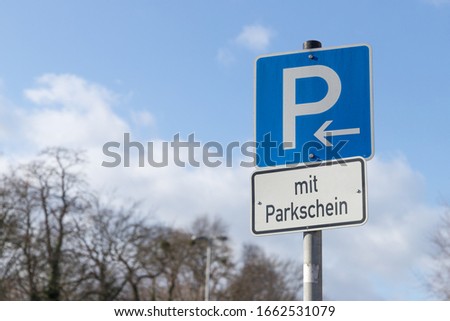 the german words "mit Parkschein" mean you need a parking ticket
