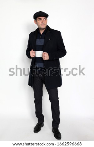Handsome middle aged man posing in studio. Style, elegance, business, gentleman, fashion concept.