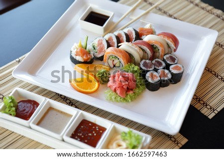 Sushi composition on a white plate