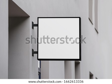 Blank store signage sign design mockup isolated, Clear shop template. Street hanging mounted on the wall. Signboard for logo presentation. Metal cafe restaurant bar plastic badge black white.  Royalty-Free Stock Photo #1662613336