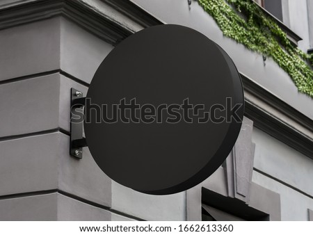 Blank store signage sign design mockup isolated, Clear shop template. Street hanging mounted on the wall. Signboard for logo presentation. Metal cafe restaurant bar plastic badge black white round.  Royalty-Free Stock Photo #1662613360