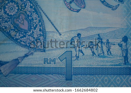 Malaysia currency of Malaysian ringgit banknotes background. Paper money of one ringgit notes on etreme closeup. Financial concept.