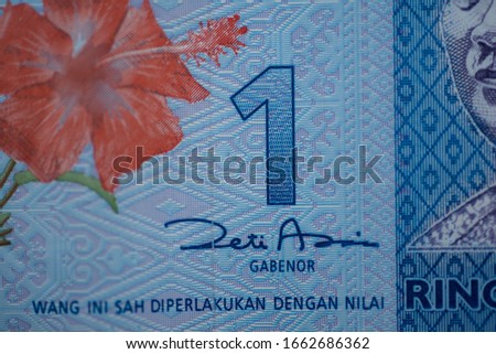 Malaysia currency of Malaysian ringgit banknotes background. Paper money of one ringgit notes on etreme closeup. Financial concept.